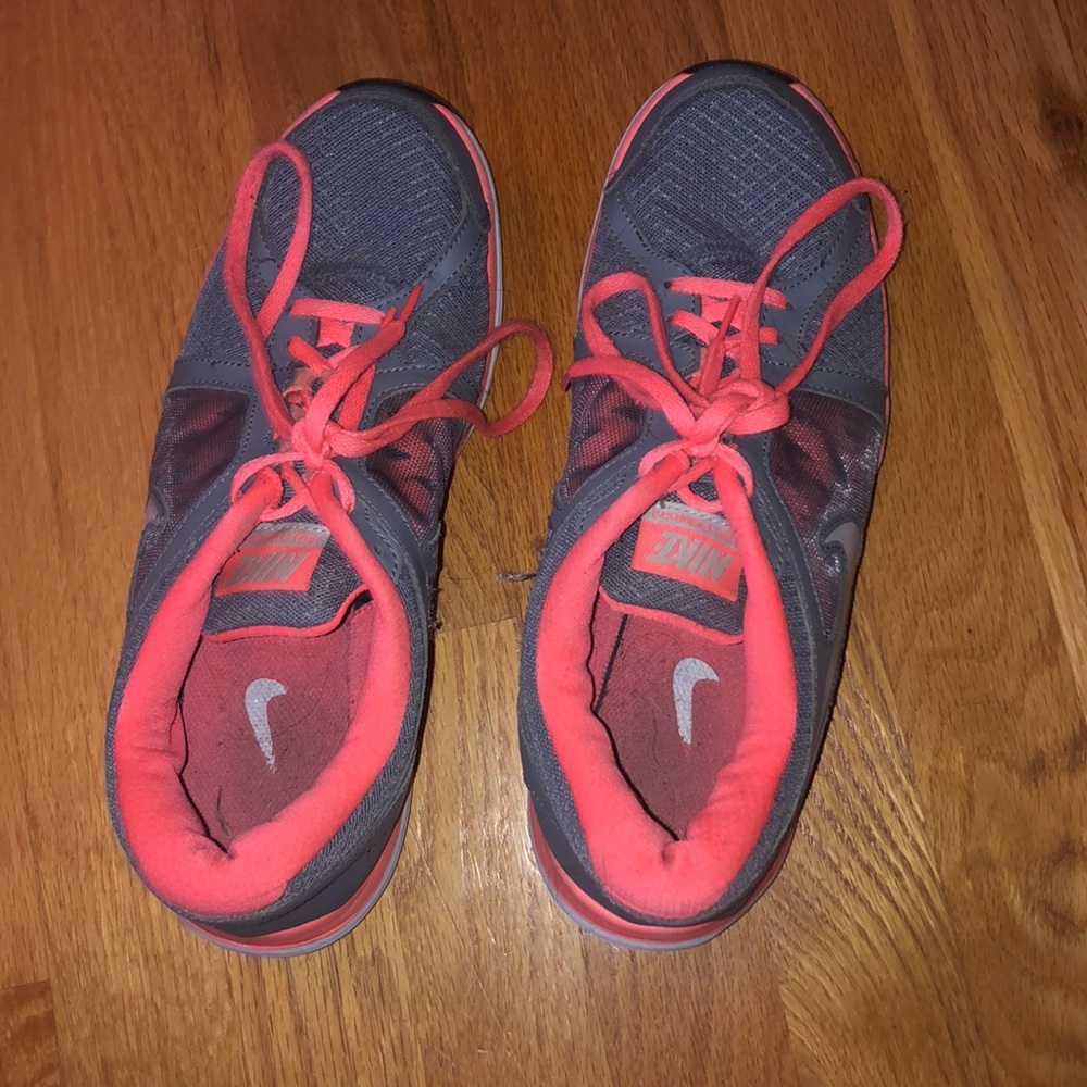 Gray and orange Nike shoes